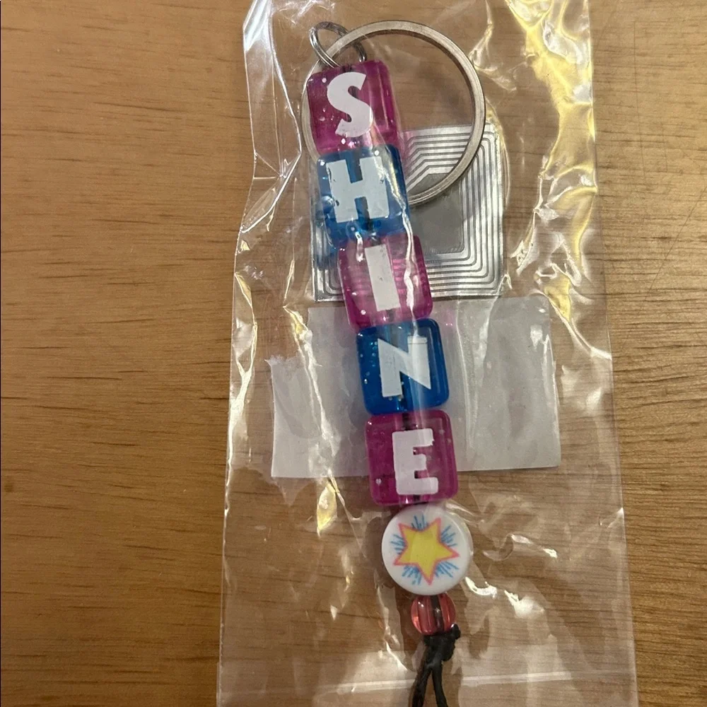 Free with bundle or purchase new Kids 🧒🏻 Shine Block Charm Keychain